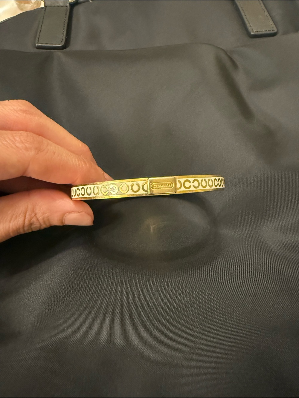 Coach Gold-Tone Signature Hinged Bangle